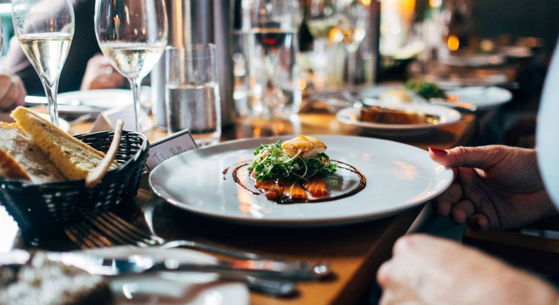 Close up of elegant dinner served at fine dining restaurant 
