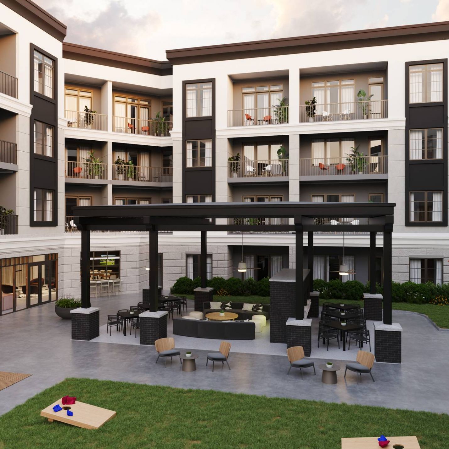 Leawood Village apartment courtyard with outdoor lounge area and lawn games